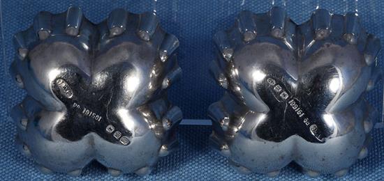 A pair of Victorian silver sweetmeat moulds,